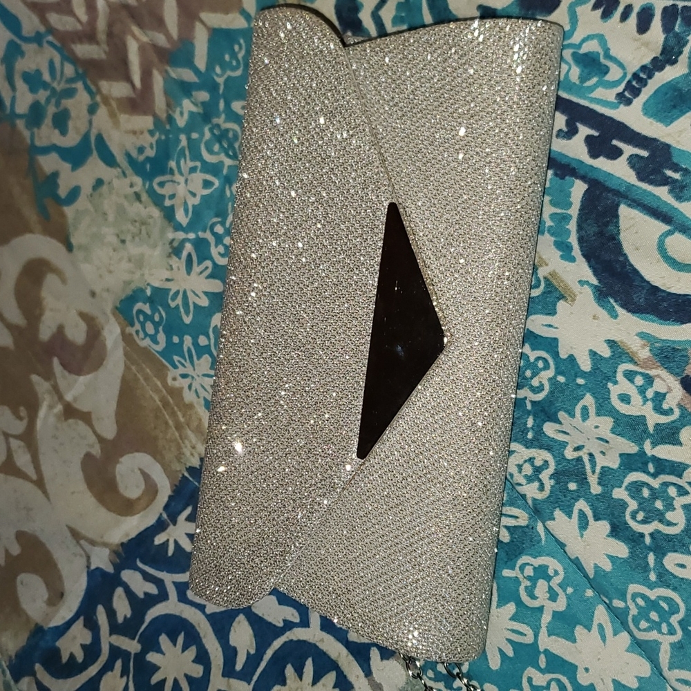 Small silver clutch with chain